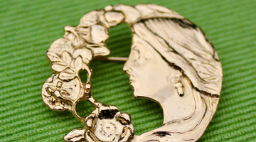 Why do we wear cameo brooches?