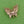 Load image into Gallery viewer, Gold butterfly brooch on a green textured background