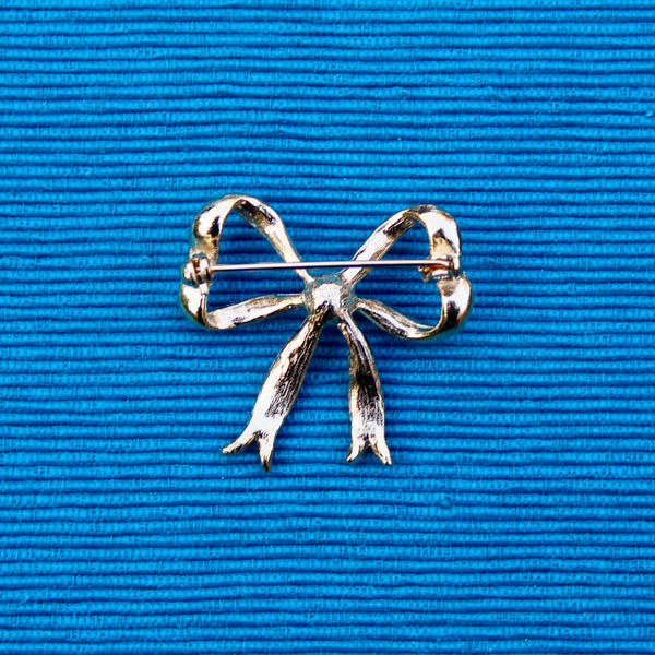 Bow with Pearl Brooch
