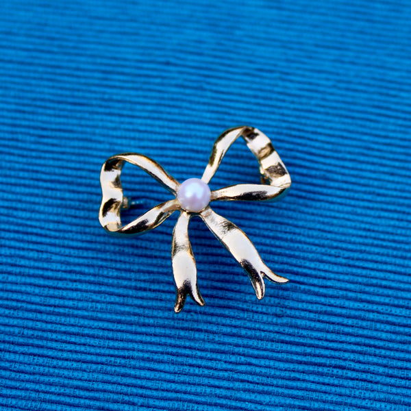 Bow with Pearl Brooch