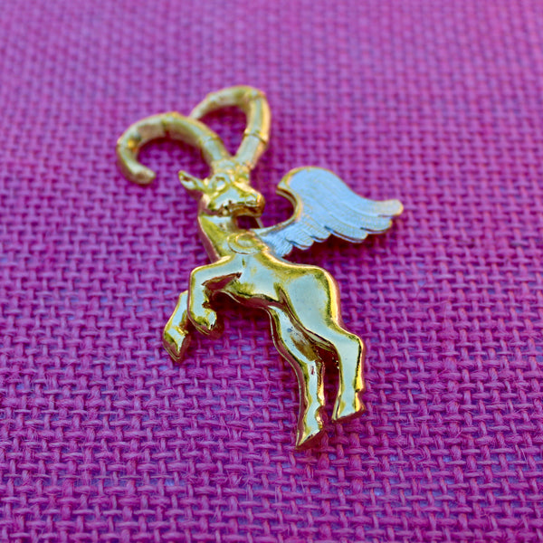 Winged Ibex with Silver Brooch