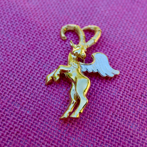 Winged Ibex with Silver Brooch