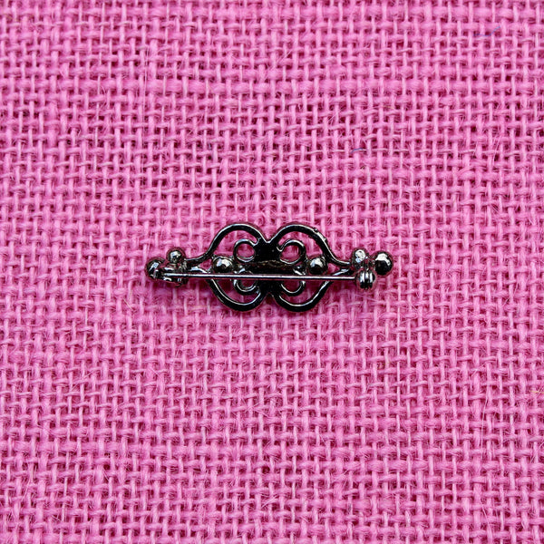 Black Antiqued Curlicue Brooch