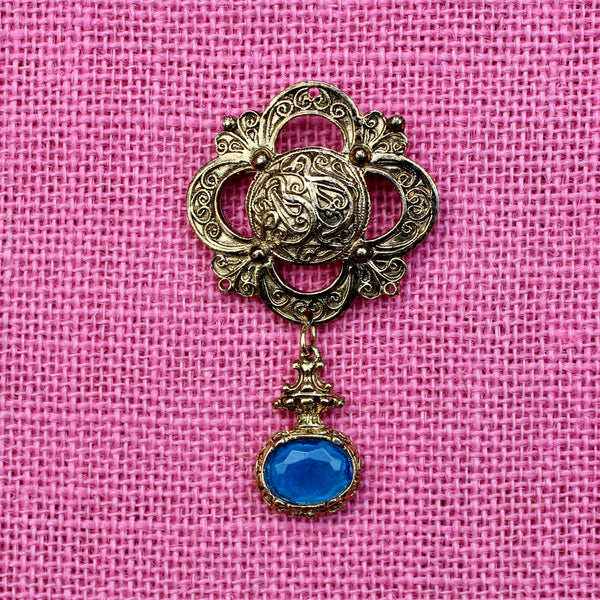 Gold Gothic Drop Brooch with Blue Stone