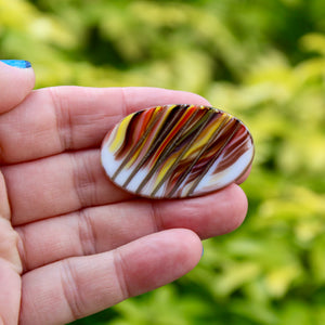 Orange and brown vintage glass brooch