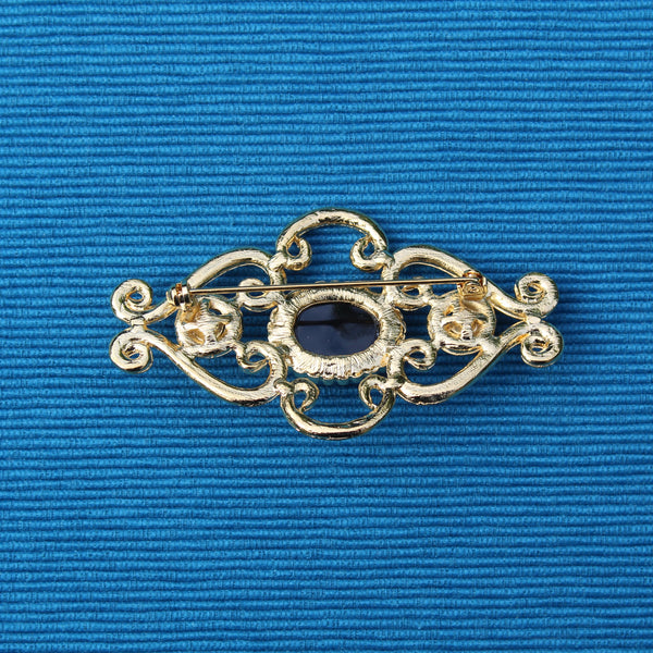 Black Gold Curlicue Brooch