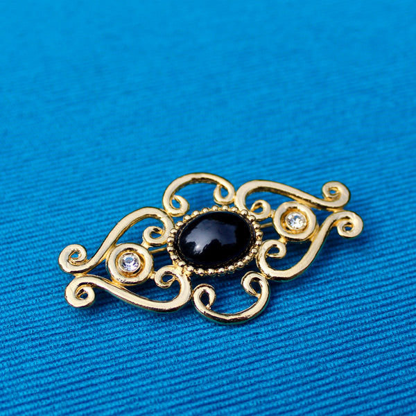 Black Gold Curlicue Brooch