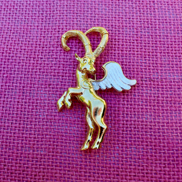 Winged Ibex with Silver Brooch