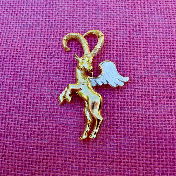 Winged Ibex with Silver Brooch