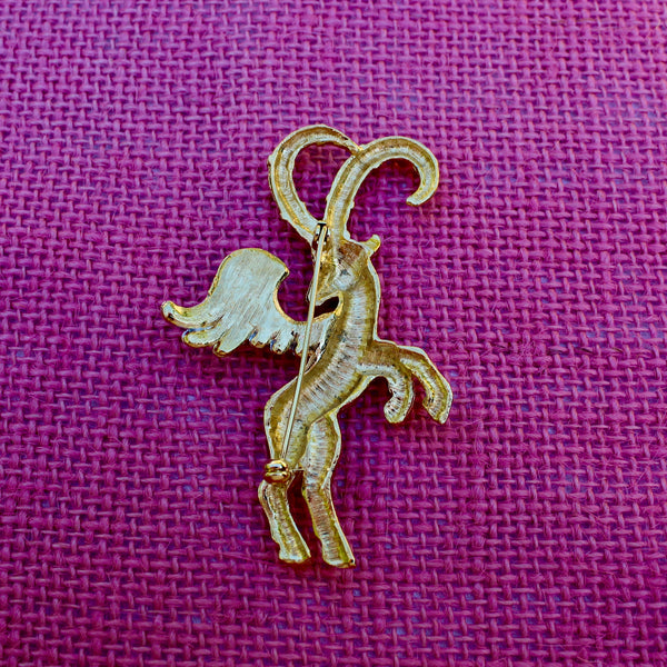 Winged Ibex with Silver Brooch