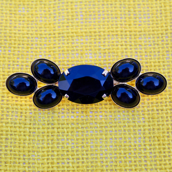 Trio of Black and Gold Brooches